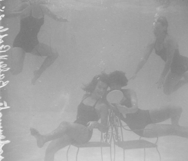 Dancers doing underwater ballet