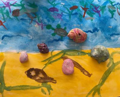 Painting of a beach with fish and shells