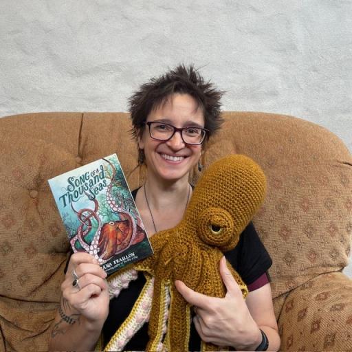 Zana Fraillon holding up book and octopus