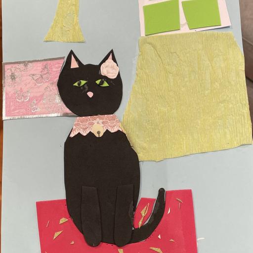 Artwork of a black cat sitting on a red rug